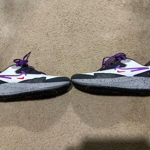 Nike Air Zoom Pegasus 39 ShieldSneakers with Purple Details